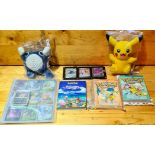 Collection of Japanese / Korean Pokemon cards, 2 books, 2 plushy Pokemon toys and 3 card display