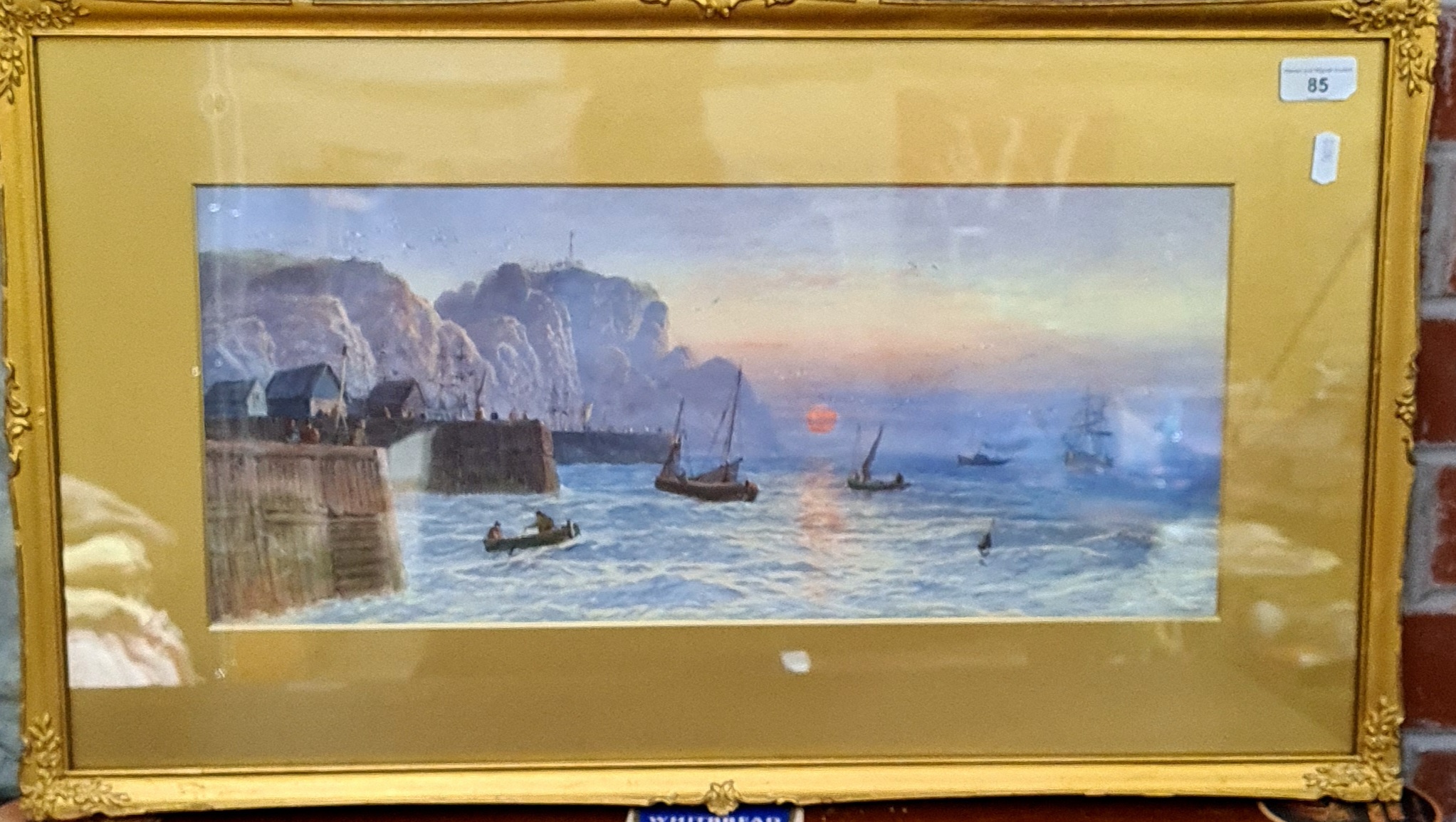 L Lewis, coastal scene, watercolour, signed lower right, 52cm x 22cm, framed and glazed.