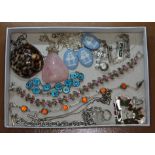 A tray of assorted costume jewellery including silver, Wedgwood cameo, shell, quartz etc.