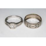 Two hallmarked 9ct white gold rings, gross wt. 5.53g, size M/N.