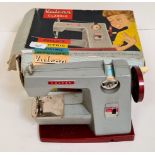 A Vulcan Classic child's electric sewing machine (battery operated)