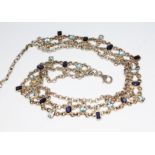 A choker necklace set with iolite and topaz, marked '925', length 28cm to 36cm.