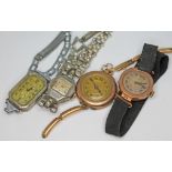 A group of ladies wrist watches comprising one 9ct gold and one yellow metal with sprung strap gross