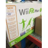 A boxed Wii Fit Plus console.