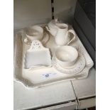 A Leeds Pottery cream ware breakfast set comprising ceramic tray, two cups and saucers, milk jug,