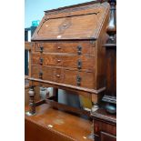 A 1920s oak bureau.