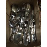 A box of plated cutlery