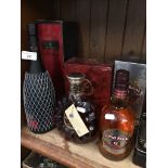 1 Litre bottle of Remy Martin fine Champagne Cognac V.S.O.P, a bottle of Remy Martin XO special fine