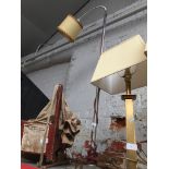 A metal adjustable standard lamp