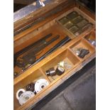 A joiners toolbox containing various tools.