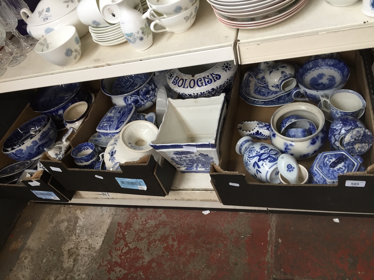 Three boxes of various blue and white pottery and a planter etc.