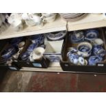 Three boxes of various blue and white pottery and a planter etc.