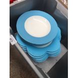 A box of Villeroy & Bosch plates and bowls.