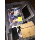 A box of mobile phones, etc