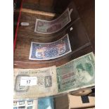 A collection of 4 vintage Armed Forces bank notes / vouchers.