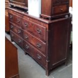 An 18th century Lancashire oak mule chest with shell inlay, the drawers being crossbanded with