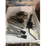 A box containing toy gun and gun lighters