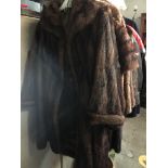 2 vintage long mink fur coats.