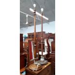 An oak standard lamp and a stained beech standard lamp.