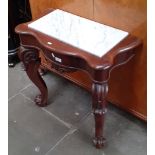 A Victorian mahogany and marble top console table.