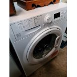 A Hotpoint Smartech 9 kilo washing machine.