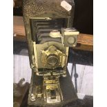 A vintage Kodak Eastman folding bellows camera.