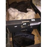 2 boxes of fur collars and hats.