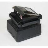 A vintage Polaroid Onyx image system camera.