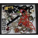 A quantity of costume jewellery including coral etc.