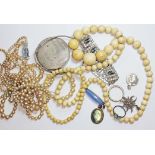 A mixed lot including a hallmarked silver compact, costume jewellery, bone beads, a labradorite