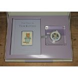 A Royal Mint Beatrix Potter The Tale of Tom Kitten silver proof 50p, boxed with book.