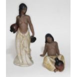 A Lladro stoneware porcelain figure of Water Girl bearing 2 pitchers, height 36 cm, and a seated