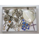 A tray of assorted silver and white metal jewellery.