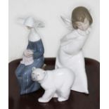 Three Lladro figures. Curious Angel 4960; Time to Sew (Blue) 5501; Attentive Polar Bear 1207. Box