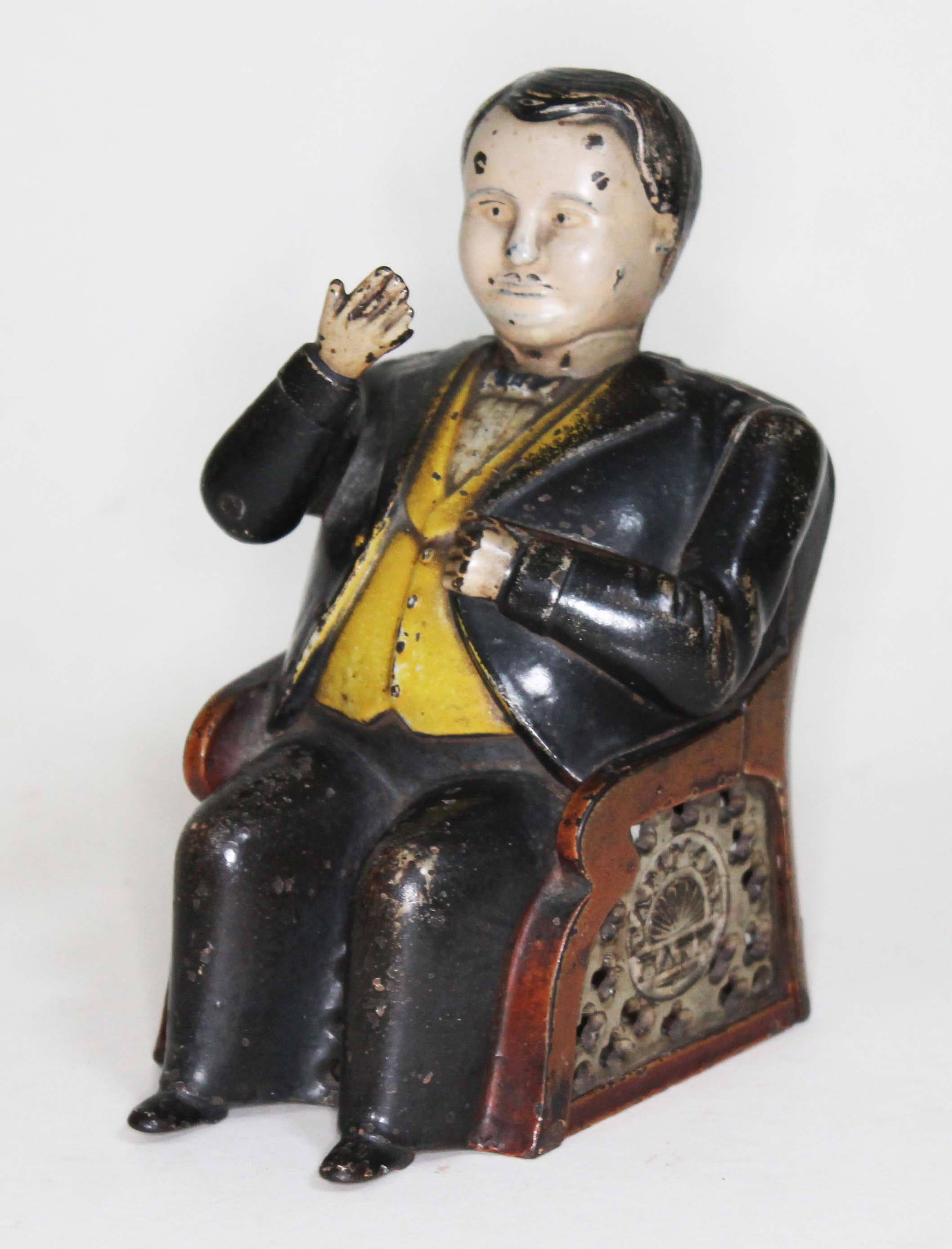 A Victorian novelty money bank Tammany Bank, patent 1875, height 15cm.