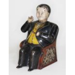 A Victorian novelty money bank Tammany Bank, patent 1875, height 15cm.