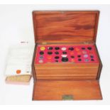 A Georgian mahogany specimen box housing an extensive collection of wax intaglio seal impressions,