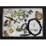 A mixed lot of assorted costume jewellery including a hard stone bracelet, a Victorian style