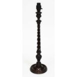 A weighted twist mahogany table lamp, height 54cm. Condition - requires re-wiring, otherwise ok,