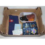 A box of collectables to include boys brigade hat and badges, souvenir penny collections and leather