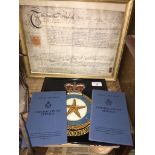 An RAF reverse painted glass panel and two Certificate of Service booklets together with an