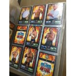 A folder of WW Face Off trading cards.