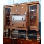 A 1930s oak bureau/ display cabinet.