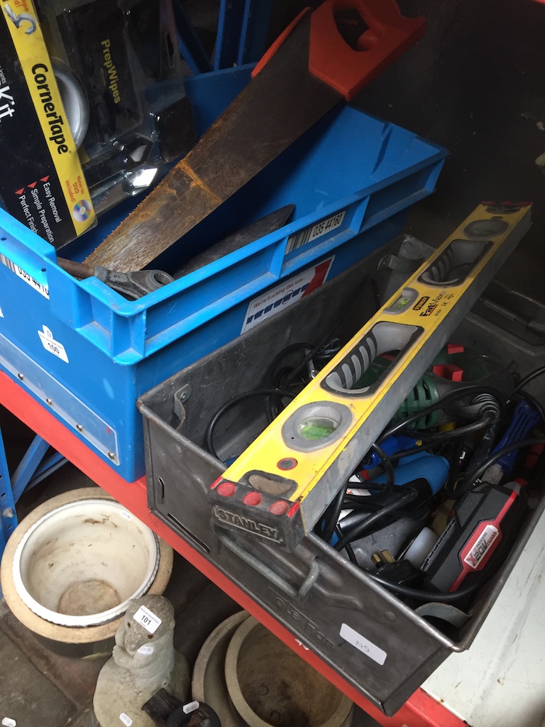 2 boxes of garageware, saws, spirit level, electric staple gun, Bosch jigsaw, etc.