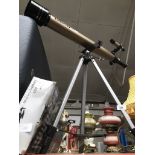 A Tasco telescope and a Zennox 50 x 600 telescope.