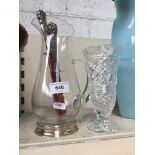 Glass jug and vase and knife and fork