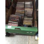 Two boxes of CDs