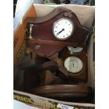 A box of mainly treen including a carved oak framed barometer, a pair of carved horse head