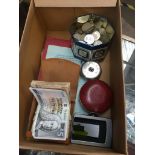 A box containing old coins, bank notes, rates of pay and working conditions booklets etc.