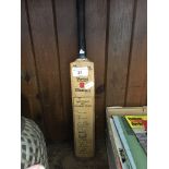 A signed mini cricket bat Australia 1977.